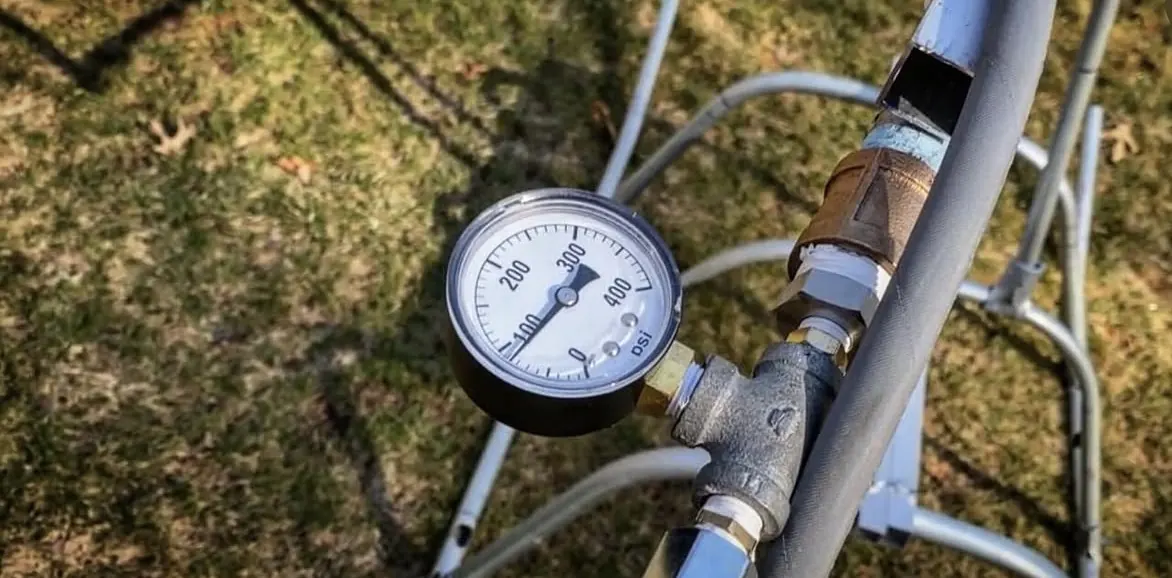 A pressure gauge on a high pressure line.