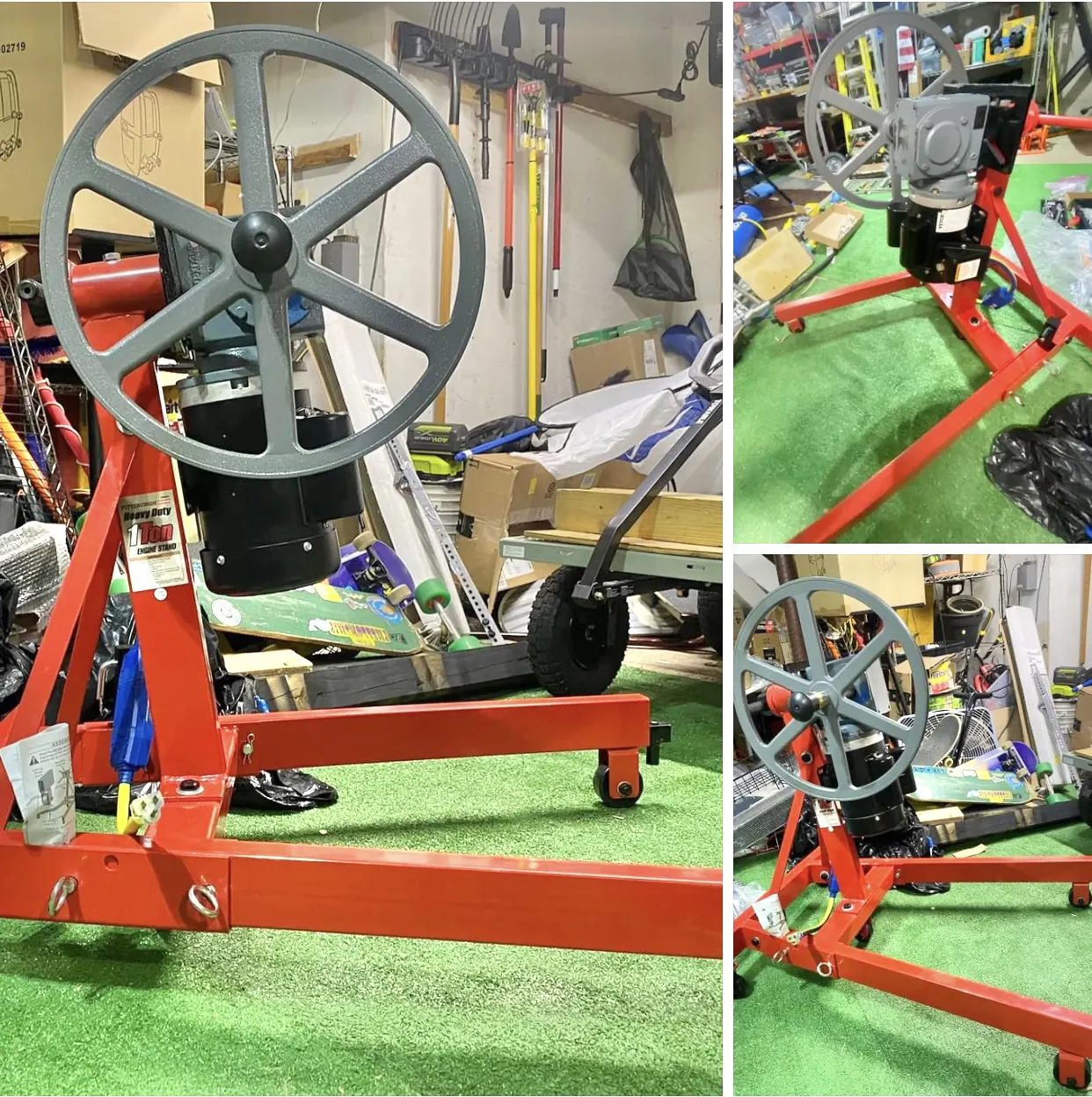 A rope tow bullwheel assembly on a red stand in the shop.